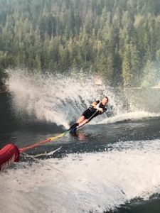 A photo of Dr. Stewart waterskiing